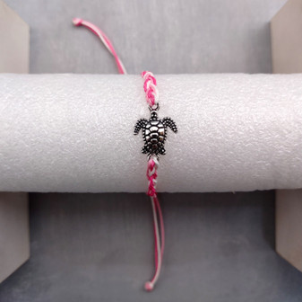 Sea Turtle Bracelet Braided Cord Magenta Pink White (approx. 5-7+ inches AROUND) Rose Blush White Knit String Sea Turtle Bracelet to gift! Copyright 2025 SeaShellSupply.com.