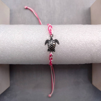 Sea Turtle Bracelet Braided Cord Magenta Pink White (approx. 5-7+ inches AROUND) Rose Blush White Knit String Sea Turtle Bracelet to gift! Copyright 2025 SeaShellSupply.com.