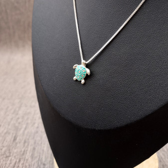 Silver Tone Sea Turtle Pendant Necklace Turquoise Shell with Crystal Accents (approx 16 inches AROUND) Aqua Silver charm for any look. Copyright 2025 SeaShellSupply.com.