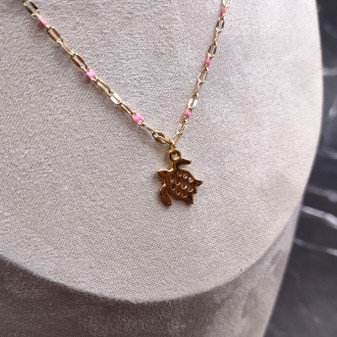 Sea Turtle Necklace Pink Gold Color (1 necklace approx. 16+ inches AROUND) Elegant Gold Tone Pink Sea Turtle charm necklace for gifting! Copyright 2025 SeaShellSupply.com.