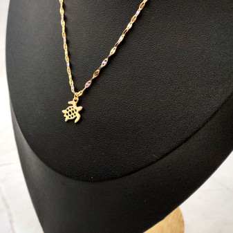 Sea Turtle Necklace Purple Gold Color (1 necklace approx. 16+ inches AROUND) Elegant Gold Tone Violet Sea Turtle charm necklace gift! Copyright 2025 SeaShellSupply.com.