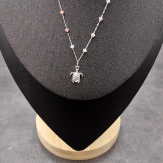 Sea Turtle Charm Necklace Delicate Pink Peach White Beads Silver Color (approx. 14+ inches AROUND) Sea Turtle Necklace for resort wear! Copyright 2025 SeaShellSupply.com.