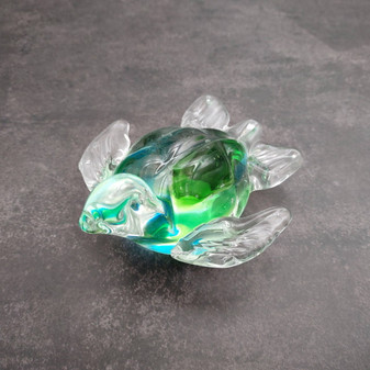 Glass Sea Turtle Figurine Spiral Aqua Green (1 figure approx. 4.5 inches long) Blue Green Glass Sea Turtle for home decor & gifting! Copyright 2025 SeaShellSupply.com.