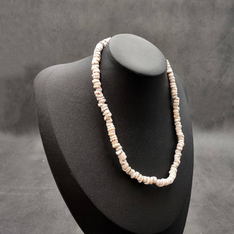 Tiger Puka Shell Necklace (16\" x 5-6mm). Two white shell necklaces. Copyright 2026 SeaShellSupply.com.