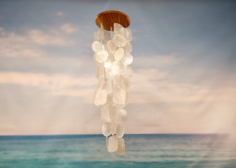White Circle and Square Capiz Wind Chime Chandelier (1 chime approx. 20 x 5.25 inches) Natural Capiz Wind Chime for coastal home décor! Copyright 2025 SeaShellSupply.com.