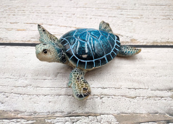 Blue Sea Turtle Figurine Painted Resin (1 turtle approx. 5.75+ inches long) Blue Painted Resin Sea Turtle Figure for coastal home decor! Copyright 2025 SeaShellSupply.com.