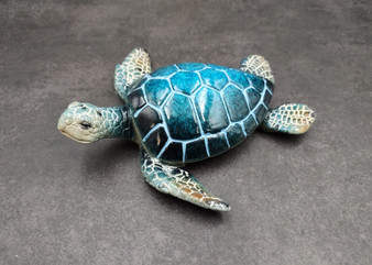 Blue Sea Turtle Figurine Painted Resin (1 turtle approx. 5+ inches long) Blue Painted Resin Sea Turtle Figure for coastal home decor! Copyright 2025 SeaShellSupply.com.