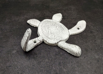 Cast Iron Antique White Sea Turtle Wall Hook (1 cast iron hook approx. 6+ inches) Functional Sea Turtle Wall Hanger for coastal home decor! Cast Iron Antique White Sea Turtle Wall Hook (1 cast iron hook approx. 6+ inches) Functional Sea Turtle Wall Hanger for coastal home decor!