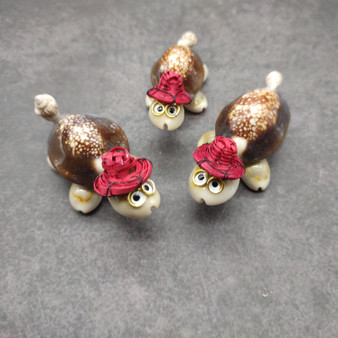 Cowrie Shell Sea Turtle Figurines Red Hat (3 figures approx. 2+ inches) Cute Cowrie Seashell Sea Turtles for gifts decor & display! Cowrie Shell Sea Turtle Figurines Red Hat (3 figures approx. 2+ inches) Cute Cowrie Seashell Sea Turtles for gifts decor & display!