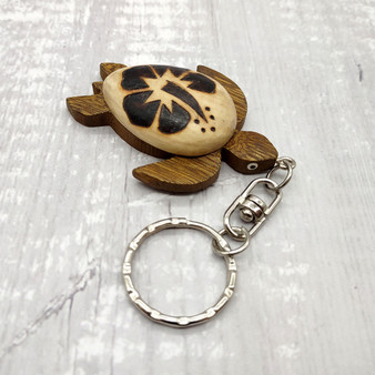 Natural Wood Hibiscus Sea Turtle Keychain (1 keychain approx. 4+ inches) Wooden Pattern Sea Turtle Key Fob for gifting or decorative charm! Natural Wood Hibiscus Sea Turtle Keychain (1 keychain approx. 4+ inches) Wooden Pattern Sea Turtle Key Fob for gifting or decorative charm!