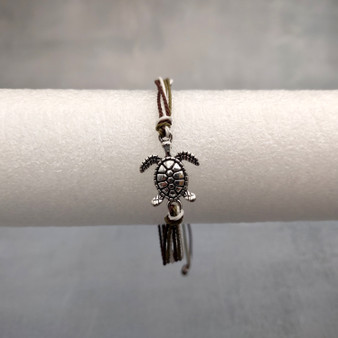 Sea Turtle Charm Bracelet Brown Green White Cord (approx. 5-7+ inches AROUND) Olive Green Brown Sea Turtle String Bracelet Jewelry to gift! Copyright 2025 SeaShellSupply.com.