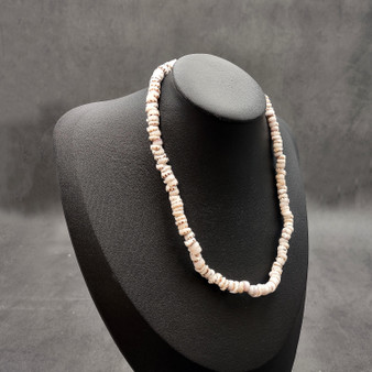 Tiger Puka Shell Necklace (16" x 5-6mm). Two white shell necklaces. Copyright 2026 SeaShellSupply.com.