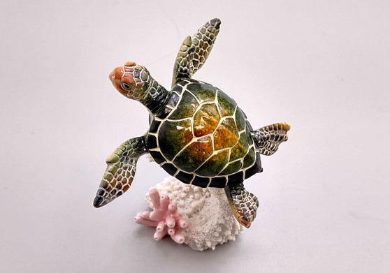 Green Sea Turtle Figurine on Coral Painted Resin (1 turtle approx. 5+ inches) Green Painted Resin Turtle Figure for coastal home décor! Copyright 2025 SeaShellSupply.com.