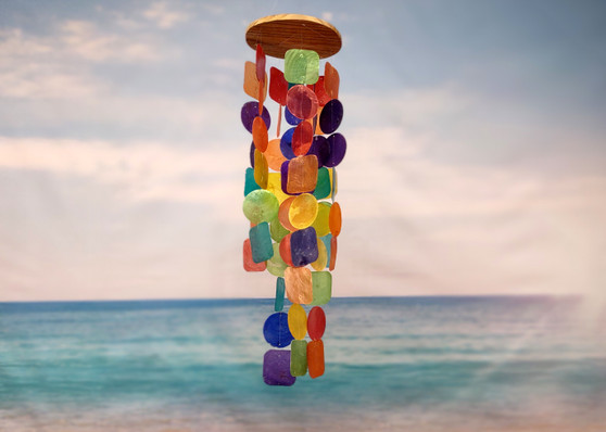 Rainbow Capiz Shell Wind Chime (1 chime approx. 21 x 5.5 inches) Colorful Capiz Shell Wind Chime adding beachside charm to any home or space! Copyright 2025 SeaShellSupply.com.