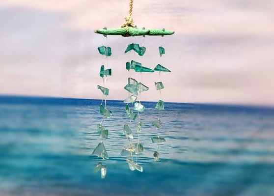 Green Starfish Hanging Beach Glass Wind Chime (1 chime approx. 10 x 5 inches) Green Starfish Seaglass Wind Chime for coastal home décor! Copyright 2025 SeaShellSupply.com.