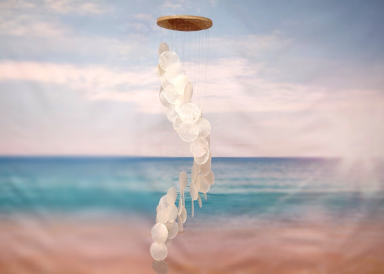 Circle White Spiral Stairway Capiz Shell WInd Chime (1 Chime approx. 31 x 5.5 inches) White Spiral Chime brings beachside charm to any home! Copyright 2025 SeaShellSupply.com.

