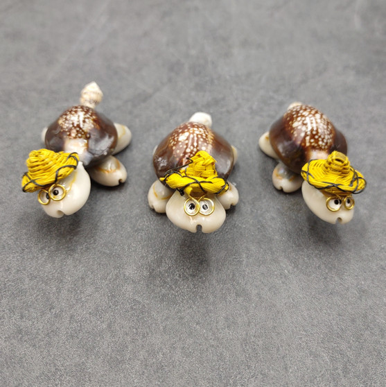Cowrie Shell Sea Turtle Figurines Yellow Hat (3 figures approx. 2+ inches) Cute Cowrie Seashell Sea Turtles for gifts decor & display! Copyright 2025 SeaShellSupply.com Cowrie Shell Sea Turtle Figurines Yellow Hat (3 figures approx. 2+ inches) Cute Cowrie Seashell Sea Turtles for gifts decor & display! Copyright 2025 SeaShellSupply.com