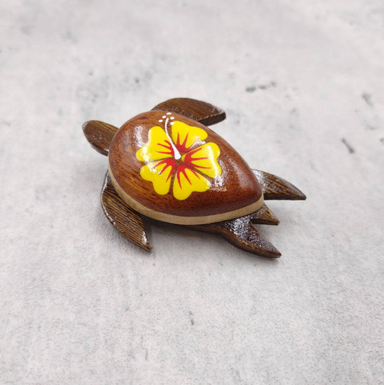 Wooden Sea Turtle Magnet Yellow Hibiscus Flower (1 magnet approx. 2+ inches) Wood Sea Turtle Magnet gift for fridges cabinets doors! Copyright 2025 SeaShellSupply.com.