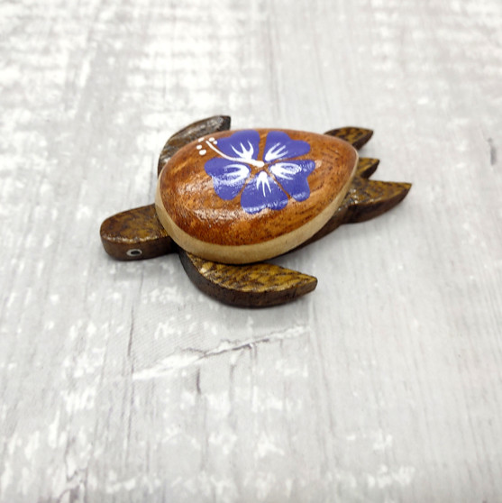 Wooden Sea Turtle Magnet Purple Hibiscus Flower (1 magnet approx. 2+ inches) Wood Sea Turtle Magnet gift for fridges cabinets doors! Copyright 2025 SeaShellSupply.com.
