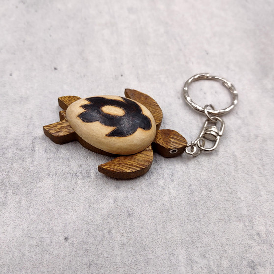 Stylized Woodburned Sea Turtle Keychain (1 keychain approx. 4+ inches) Burnt Wooden Sea Turtle Key Fob for gifting or decorative charm! Copyright 2025 SeaShellSupply.com.