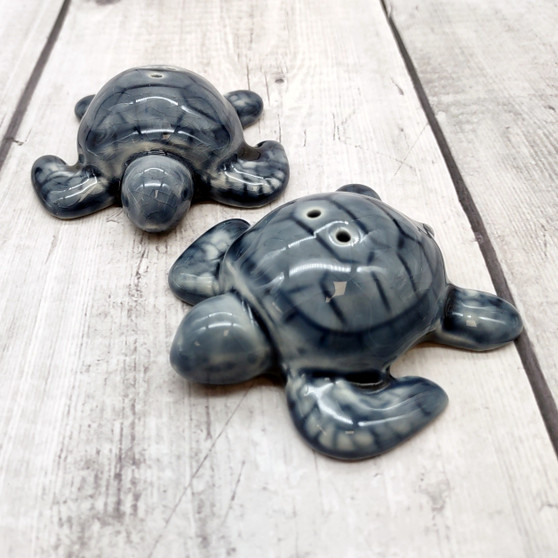 Sea Turtle Salt Pepper Shaker Set Dark Blue White (1 shaker set approx. 3 inches) Blue Sea Turtle Spice Shaker Set for kitchen or table!  Copyright 2025 SeaShellSupply.com.