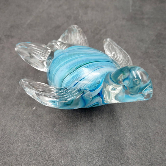 Aqua Blue Swirl Glass Sea Turtle Figurine (1 figure approx. 4.5 inches long) Aqua Blue Glass Sea Turtle for coastal home decor & collecting! Copyright 2025 SeaShellSupply.com.