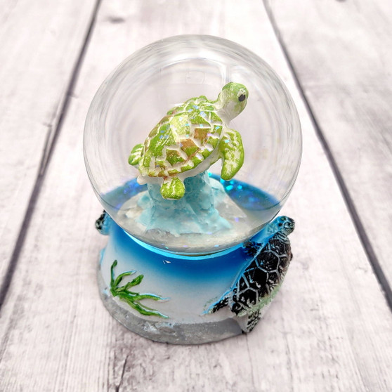Colorful Green Sea Turtle Water Glass Globe (1 globe approx. 3.5+ inches tall) Detailed Sea Turtle Water Globe for home décor & display! Copyright 2025 SeaShellSupply.com.\n
