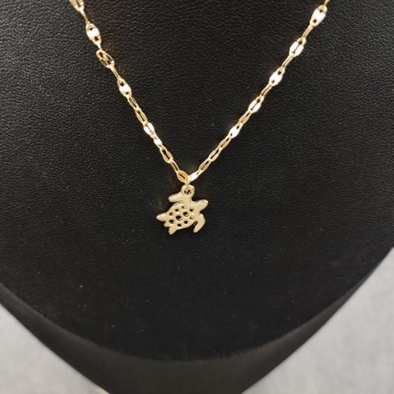 Sea Turtle Necklace White and Gold Color (1 necklace approx. 16+ inches AROUND) Gold Tone White Sea Turtle charm necklace for gifting! Copyright 2025 SeaShellSupply.com.
