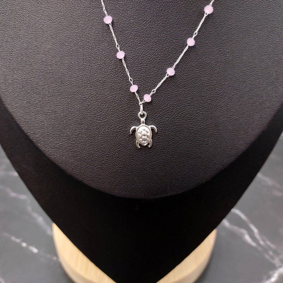 Sea Turtle Charm Necklace Delicate Pink Beads Silver Color (approx. 14+ inches AROUND) Silver Sea Turtle Charm Necklace for resort wear! Copyright 2025 SeaShellSupply.com.\n