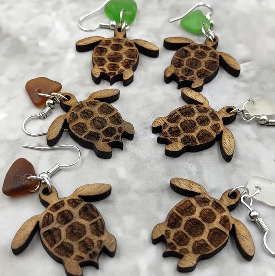 Wooden Sea Turtle Sea Glass Earrings (2 earrings approx. 1+ inches) Wood Sea Turtle Earrings Man Made Seaglass for beach fashion & gifts! Copyright 2026 SeaShellSupply.com
