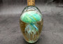Jellyfish Glass Egg Green Yellow Blue Paperweight Glow In The Dark (1 figurine approx. 4.5 inches tall) Glass Sea Jellies make great gifts! Jellyfish Glass Egg Green Yellow Blue Paperweight Glow In The Dark (1 figurine approx. 4.5 inches tall) Glass Sea Jellies make great gifts!