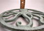 Octopus Trivet Cast Iron Green Weathered Hot Pad (1 trivet approx. 7 inch diameter) Green Metal Octopus Trivet for coastal dining table!