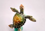 Green Sea Turtle Figurine Riding A Wave (One figure approx. 5+ inches long) Wonderful sea life décor for your home or office! Copyright 2025 SeaShellSupply.com.