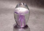 Jellyfish Glass Egg Purple Paperweight Glows (1 figurine approx. 3.5 in tall). Copyright 2025 SeaShellSupply.com.