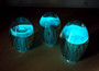 Jellyfish Glass Egg Light Blue Pink Paperweight Glow In The Dark (1 figurine approx. 3.5 inches tall). Copyright 2025 SeaShellSupply.com.
