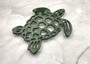 Cast Iron Sea Turtle Green Metal Trivet (1 trivet approx. 7+ inches wide) Green Metal Sea Turtle Trivet adds coastal charm & protection! Copyright 2025 SeaShellSupply.com.