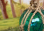 Hanging Nautical Garland Green Glass Float Shells (1 Garland approx. 18 x 5 inches) Green Glass Float Shells Mobile for beachy home decor! Copyright 2025 SeaShellSupply.com.