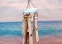 Hanging Wooden Fish Bamboo Windchime (1 Chime approx. 28 x 6.5 inches) Painted fish bamboo windchime brings beachside charm to any home! Copyright 2025 SeaShellSupply.com.