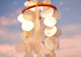 White Capiz Shell Wind Chime Chandelier (1 chime approx. 10 x 4 inches) Natural White Capiz Shell Wind Chime for coastal home décor! Copyright 2025 SeaShellSupply.com.