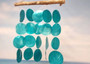 Turquoise Capiz Shell Flat Wind Chime (1 Chime approx. 13 x 16 inches) Turquoise Capiz Shell Flat Wind Chime for beachside home charm! Copyright 2025 SeaShellSupply.com.