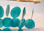 Turquoise Capiz Shell Flat Wind Chime (1 Chime approx. 13 x 16 inches) Turquoise Capiz Shell Flat Wind Chime for beachside home charm! Copyright 2025 SeaShellSupply.com.