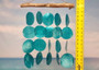 Turquoise Capiz Shell Flat Wind Chime (1 Chime approx. 13 x 16 inches) Turquoise Capiz Shell Flat Wind Chime for beachside home charm! Copyright 2025 SeaShellSupply.com.