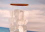 White Circle and Square Capiz Wind Chime Chandelier (1 chime approx. 20 x 5.25 inches) Natural Capiz Wind Chime for coastal home décor! Copyright 2025 SeaShellSupply.com.