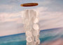 White Circle and Square Capiz Wind Chime Chandelier (1 chime approx. 20 x 5.25 inches) Natural Capiz Wind Chime for coastal home décor! Copyright 2025 SeaShellSupply.com.
