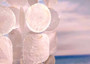 White Circle and Square Capiz Wind Chime Chandelier (1 chime approx. 20 x 5.25 inches) Natural Capiz Wind Chime for coastal home décor! Copyright 2025 SeaShellSupply.com.