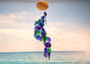 Purple Green Spiral Capiz Shell WInd Chime (1 Chime approx. 23 x 5 inches) Green Purple Capiz Wind Chime brings beachside charm to any home! Copyright 2025 SeaShellSupply.com.