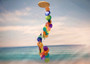 Rainbow Spiral Round Cut Capiz Wind Chime (1 chime approx. 25 x 5 inches) Colorful Capiz Shell Wind Chime adding coastal charm to any home! Copyright 2025 SeaShellSupply.com.
