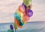 Rainbow Spiral Round Cut Capiz Wind Chime (1 chime approx. 25 x 5 inches) Colorful Capiz Shell Wind Chime adding coastal charm to any home! Copyright 2025 SeaShellSupply.com.