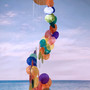 Rainbow Spiral Round Cut Capiz Wind Chime (1 chime approx. 25 x 5 inches) Colorful Capiz Shell Wind Chime adding coastal charm to any home! Copyright 2026 SeaShellSupply.com.