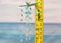Green Starfish Hanging Beach Glass Wind Chime (1 chime approx. 10 x 5 inches) Green Starfish Seaglass Wind Chime for coastal home décor! Copyright 2025 SeaShellSupply.com.
